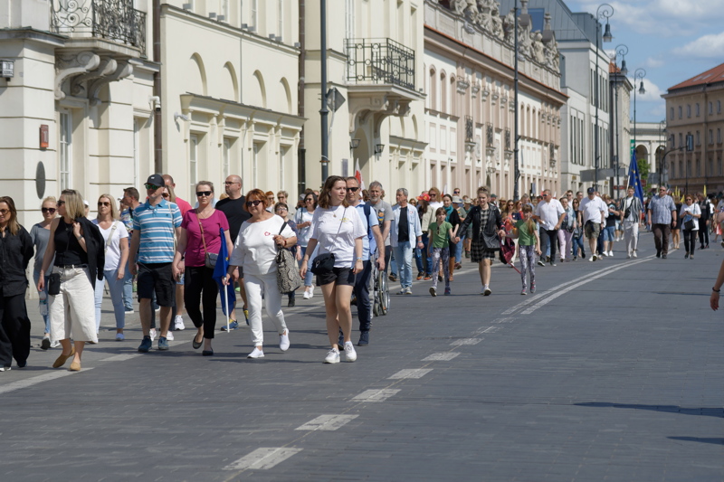 Crowd walking along Nowy Świat Street in Warsaw, Poland